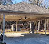 Photo of a patio carport addition by MCM Homes