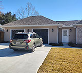 Photo of a two car garage addition built by MCM Homes, LLC